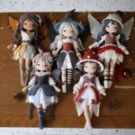 Five handmade crochet fairy dolls with detailed outfits and wings