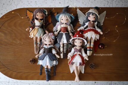 Five handmade crochet fairy dolls with detailed outfits and wings