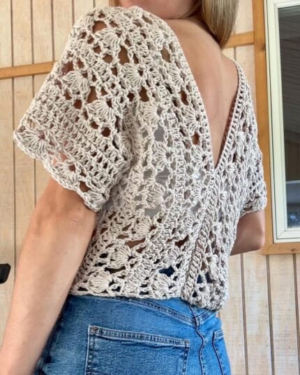 Beige openwork crochet top with floral lace pattern